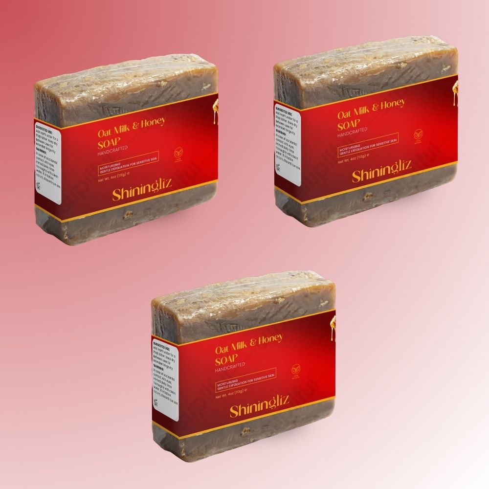 Three bars of Shiningiz oat milk and honey soap on a pink background